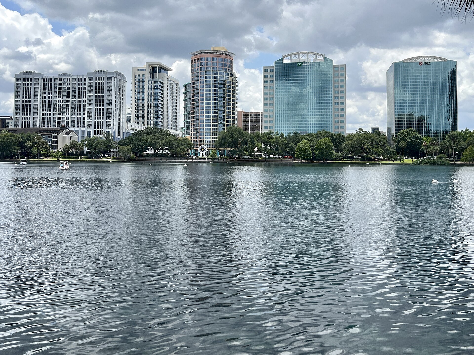 Downtown Orlando skyline reflected across Lake Eola